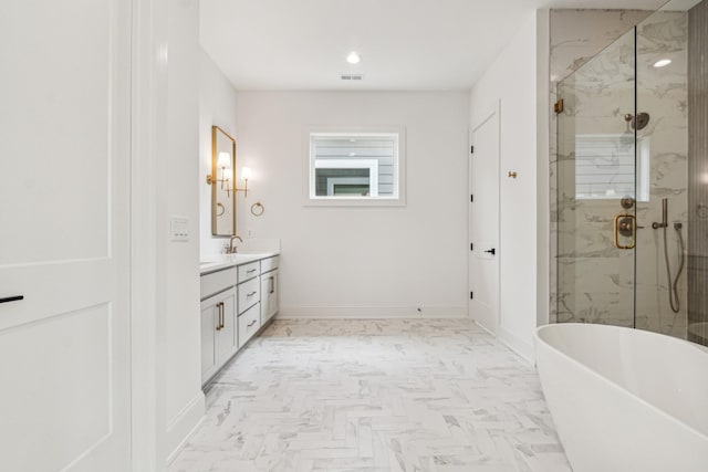 bathroom with vanity and separate shower and tub