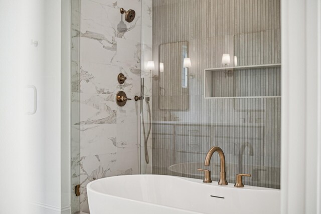 bathroom featuring tiled shower