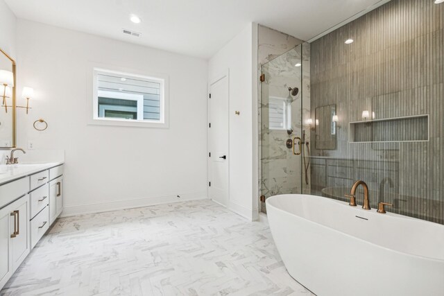 bathroom with vanity, tile patterned flooring, and separate shower and tub