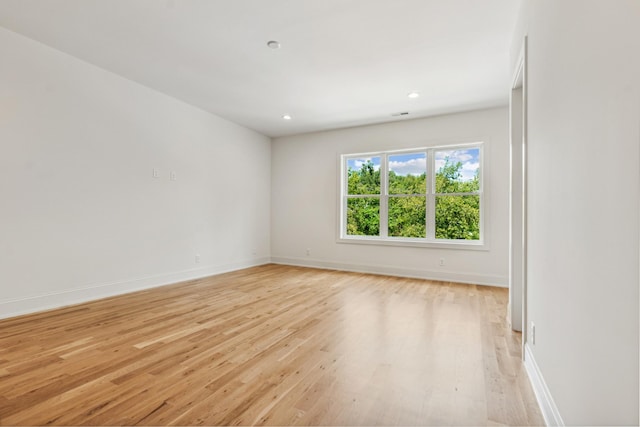 empty room with light wood-type flooring