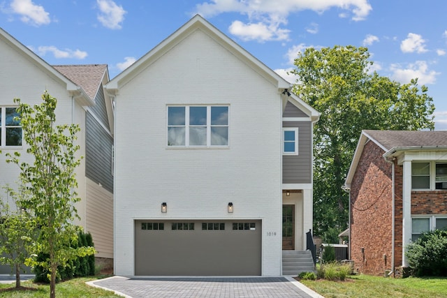 view of front of property with a garage