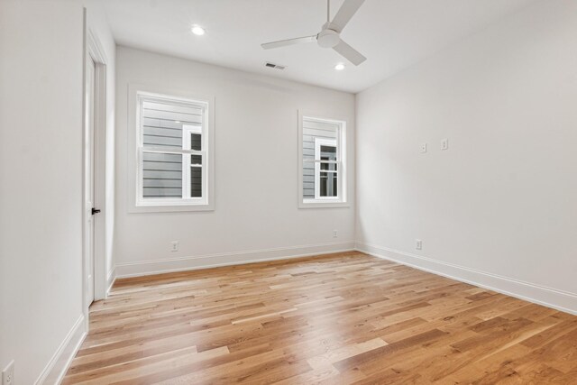 unfurnished room featuring light wood-type flooring and ceiling fan