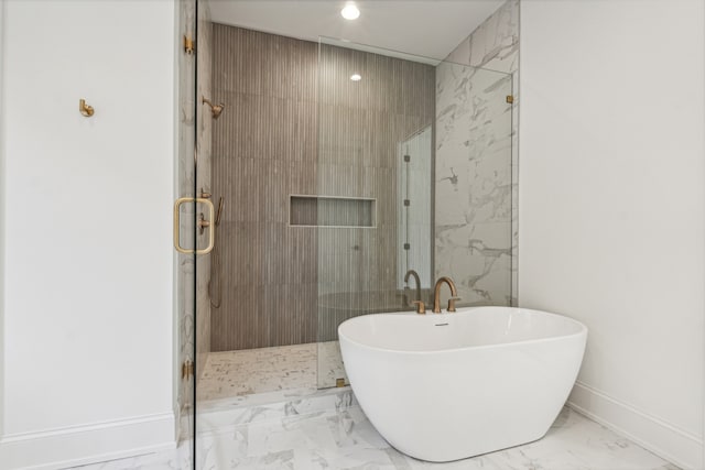 bathroom with tile patterned floors and independent shower and bath