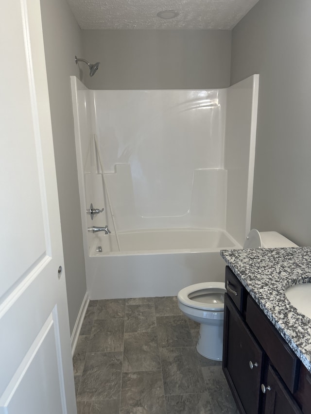 full bath featuring toilet, shower / tub combination, a textured ceiling, and vanity