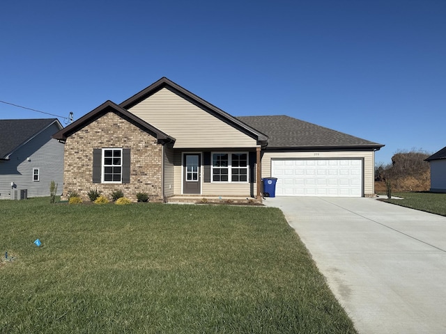 view of front of house with a garage, a shingled roof, concrete driveway, a front lawn, and brick siding