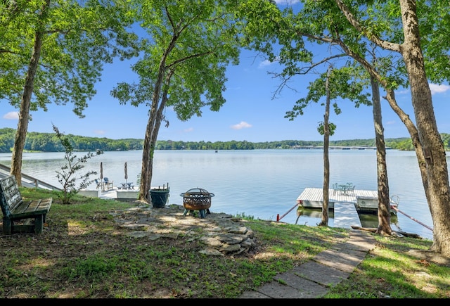 dock area with a water view