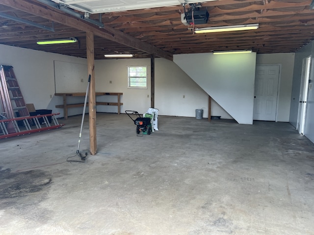 garage featuring a garage door opener