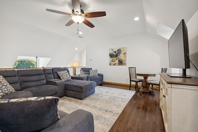 living room with ceiling fan, dark hardwood / wood-style flooring, and lofted ceiling