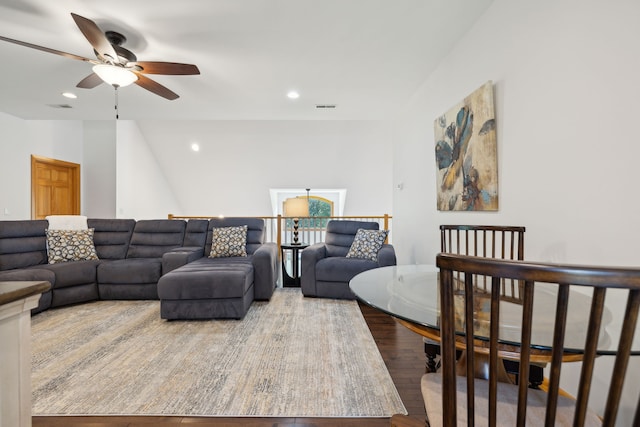 living room with ceiling fan and hardwood / wood-style floors