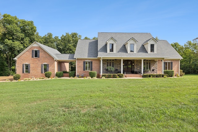 new england style home featuring a front lawn