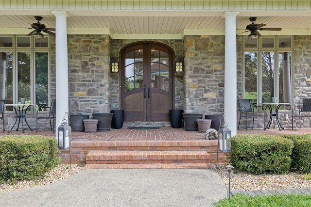 doorway to property featuring ceiling fan and french doors