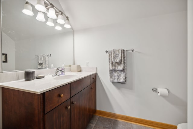 bathroom with tile patterned floors and vanity