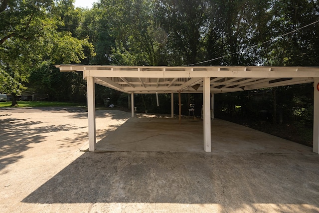 view of parking / parking lot with a carport