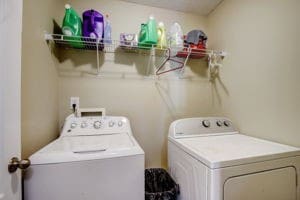 laundry room featuring washing machine and clothes dryer