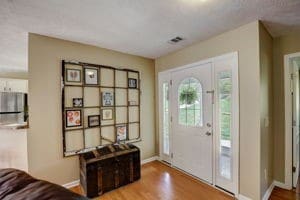 entryway with wood-type flooring