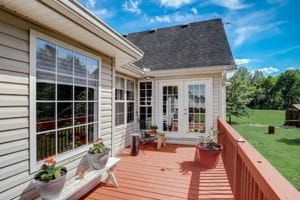 wooden deck featuring french doors