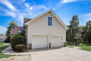 view of side of property featuring a garage