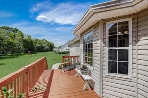 wooden deck with a yard