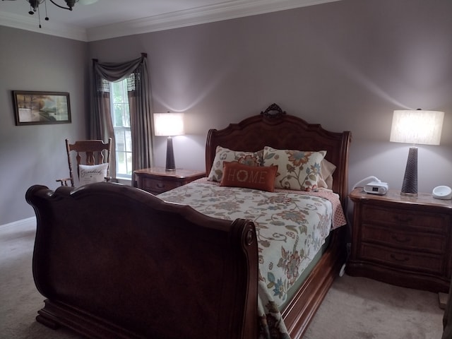 bedroom with light carpet, crown molding, and ceiling fan