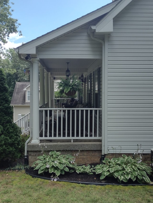 view of home's exterior featuring covered porch