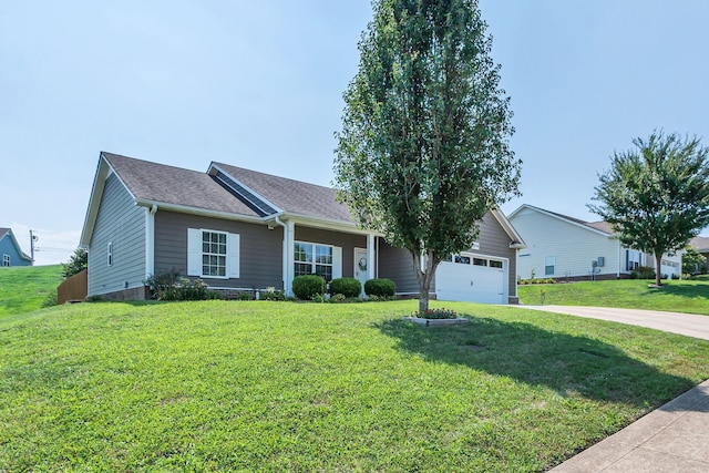 single story home with a front yard and a garage