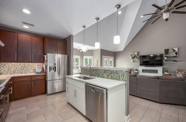 588 E Church St, Alamo, TN 38001 - kitchen featuring stainless steel appliances, a sink, visible vents, light countertops, and decorative light fixtures