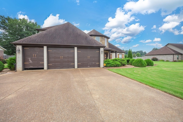 588 E Church St, Alamo, TN 38001 - view of front of home with driveway, a front lawn, an attached garage, and a shingled roof