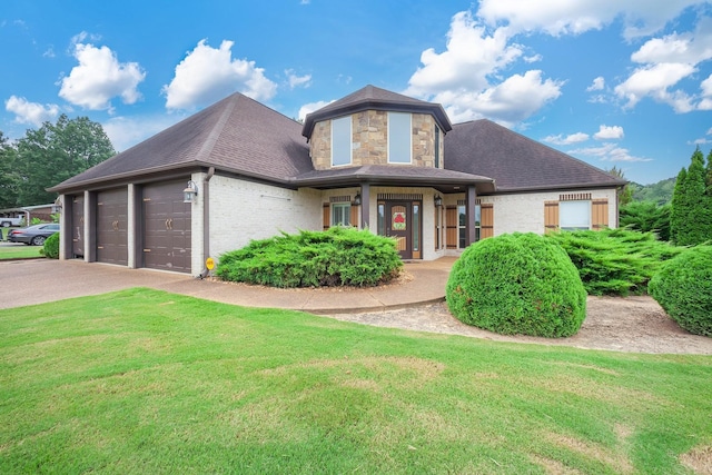 588 E Church St, Alamo, TN 38001 - view of front of home featuring roof with shingles, a garage, stone siding, driveway, and a front lawn