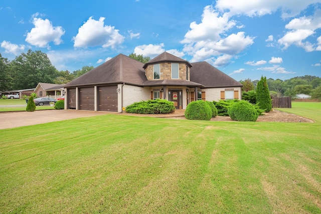 588 E Church St, Alamo, TN 38001 - view of front of property featuring brick siding, roof with shingles, concrete driveway, an attached garage, and a front yard