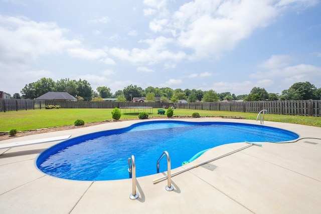 588 E Church St, Alamo, TN 38001 - view of swimming pool featuring a yard, a patio area, a fenced backyard, and a fenced in pool