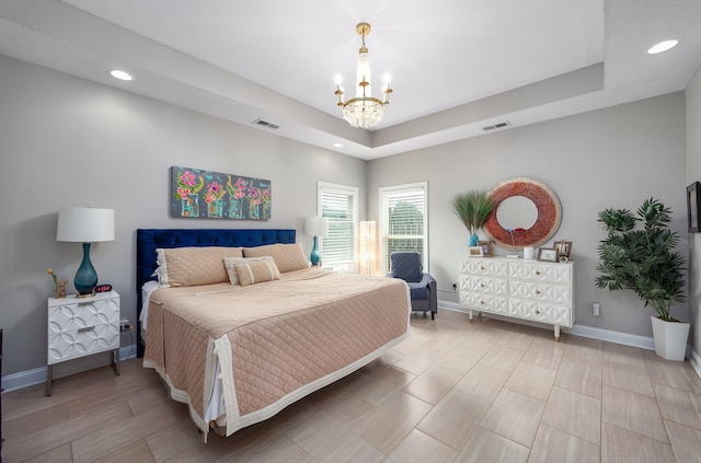 588 E Church St, Alamo, TN 38001 - bedroom with baseboards, visible vents, and a raised ceiling