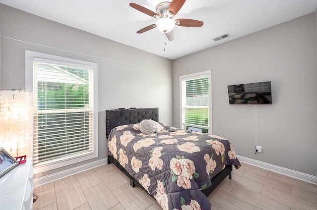 588 E Church St, Alamo, TN 38001 - bedroom with baseboards, multiple windows, and visible vents