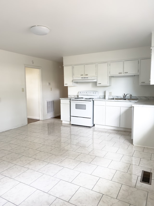 kitchen with sink, white cabinetry, light tile patterned floors, and white electric range