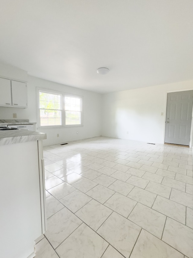 view of tiled spare room