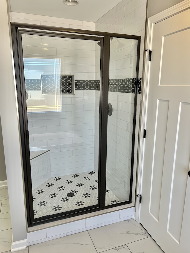 bathroom with walk in shower