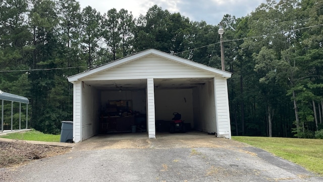 garage featuring a carport