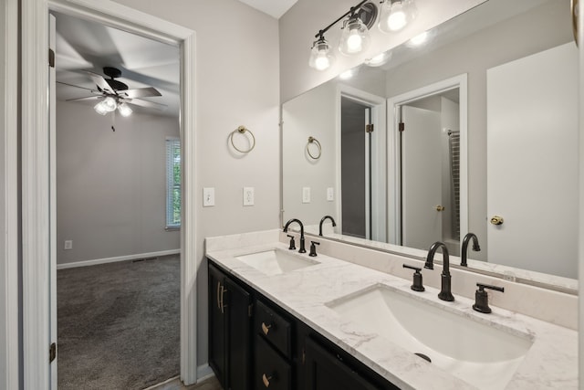 bathroom with dual bowl vanity and ceiling fan