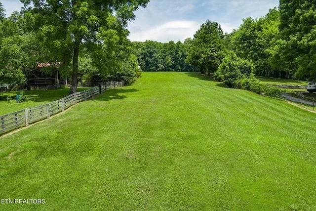 view of yard featuring fence