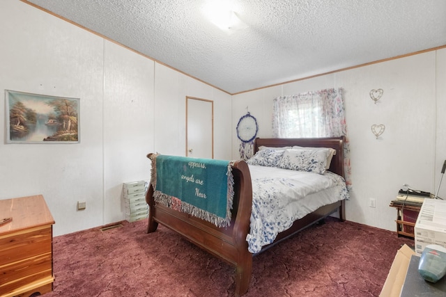 carpeted bedroom with ornamental molding, lofted ceiling, and a textured ceiling