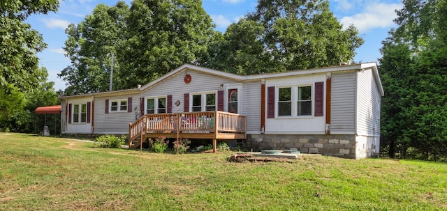 view of front of home featuring a deck and a front yard