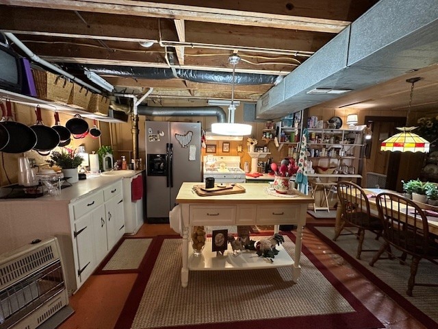 interior space featuring stainless steel fridge