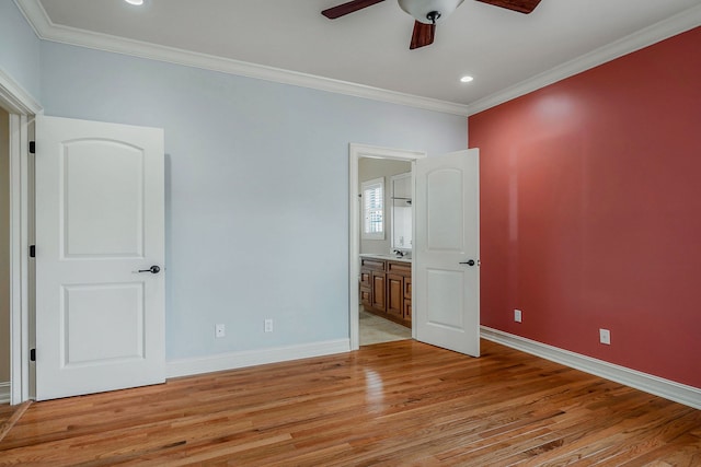 unfurnished bedroom with light hardwood / wood-style floors, connected bathroom, ornamental molding, and ceiling fan