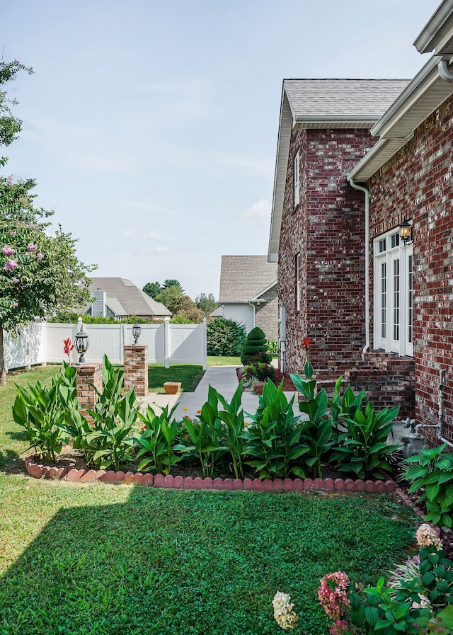 view of yard with french doors