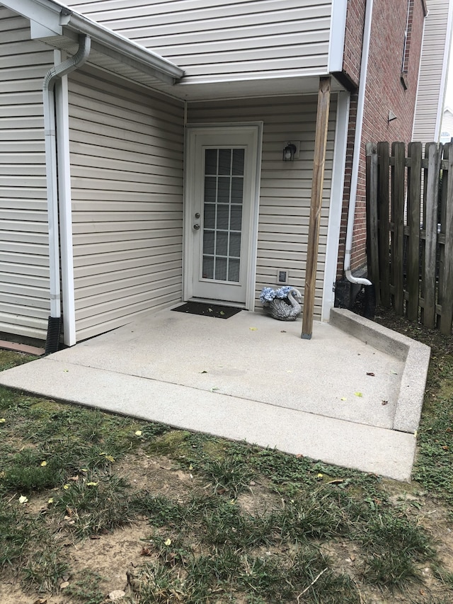 doorway to property featuring a patio