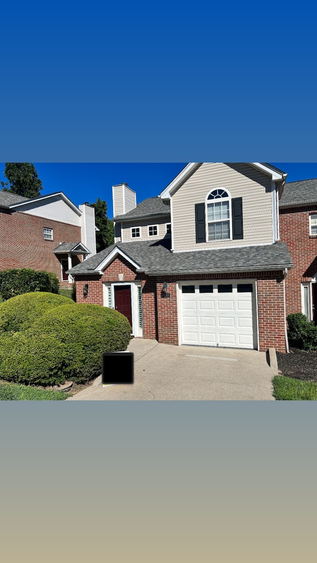 front of property featuring a garage