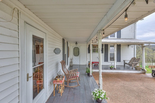 wooden terrace with covered porch