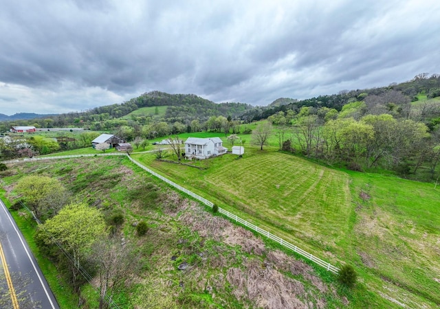 bird's eye view featuring a rural view and a mountain view