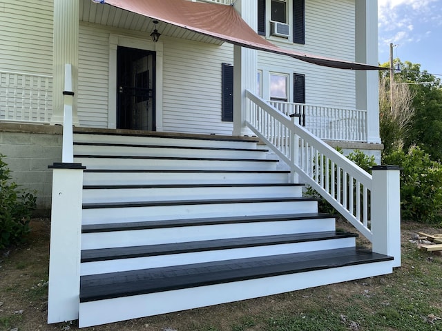 doorway to property with covered porch