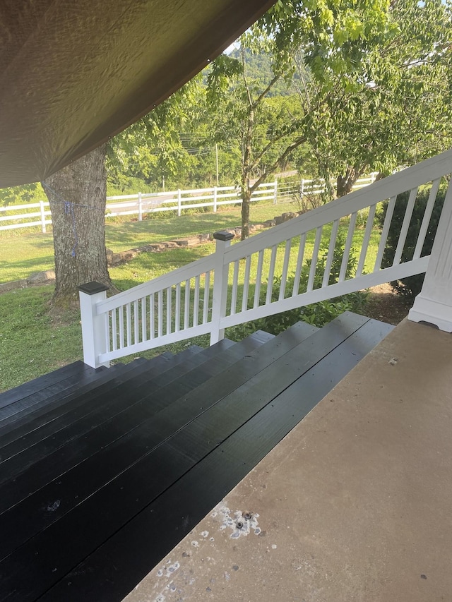 view of patio featuring fence