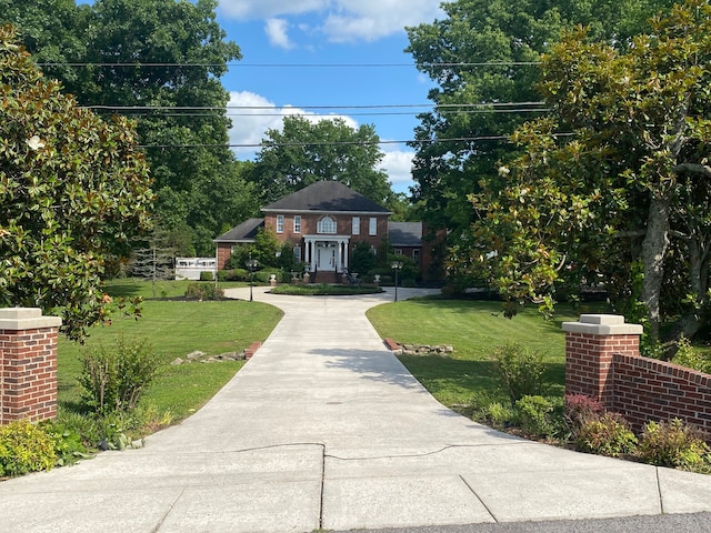 exterior space featuring a front lawn